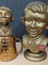 Image of Alfred E. Neuman Award (TV Prop) compared to the German award